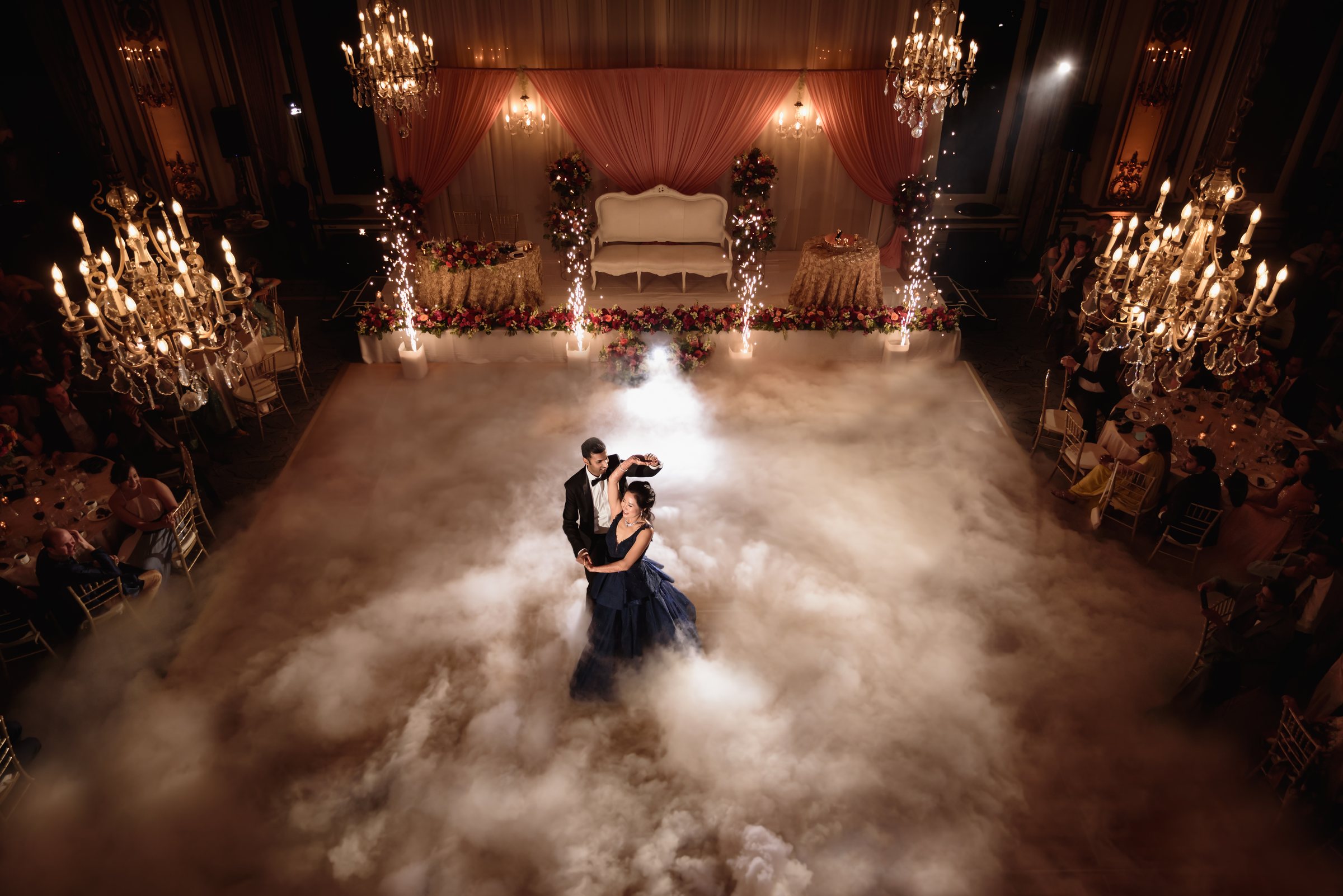 First dance on a cloud of low fog under cold spark fountains in the Fairmont San Francisco Gold Room