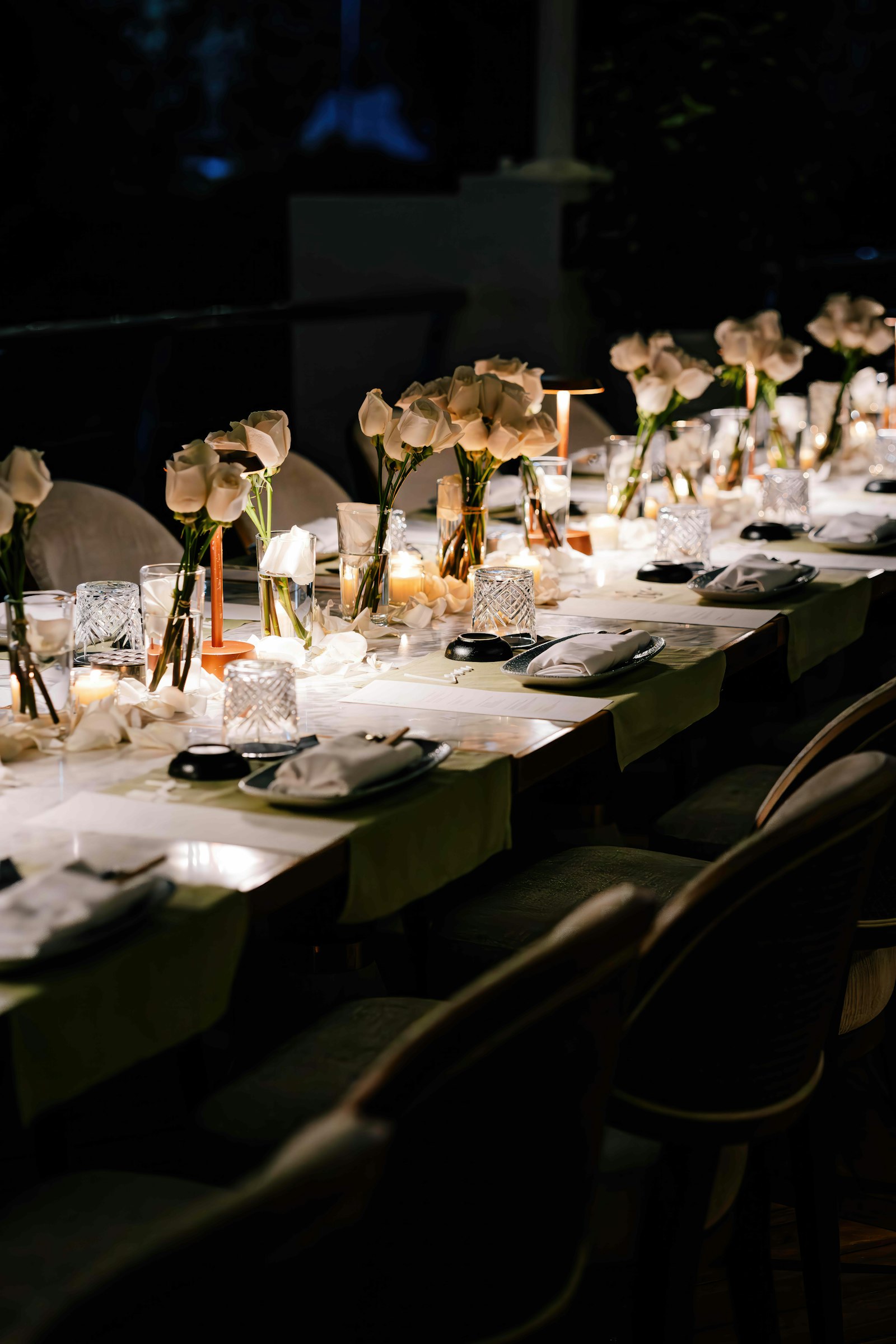 Pin spot lighting on reception centerpieces