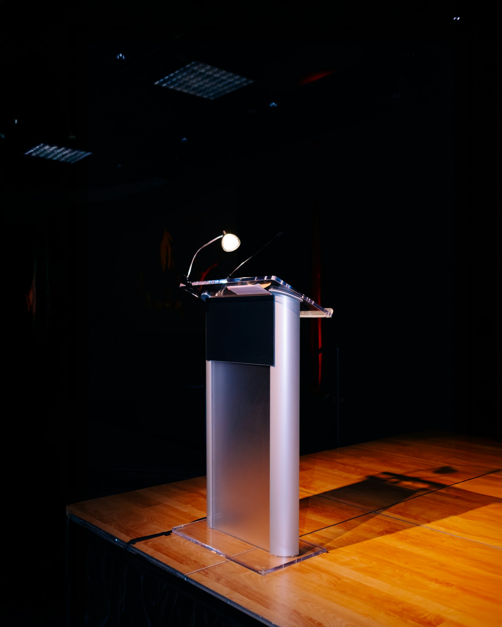 Keynote podium in a clean spotlight