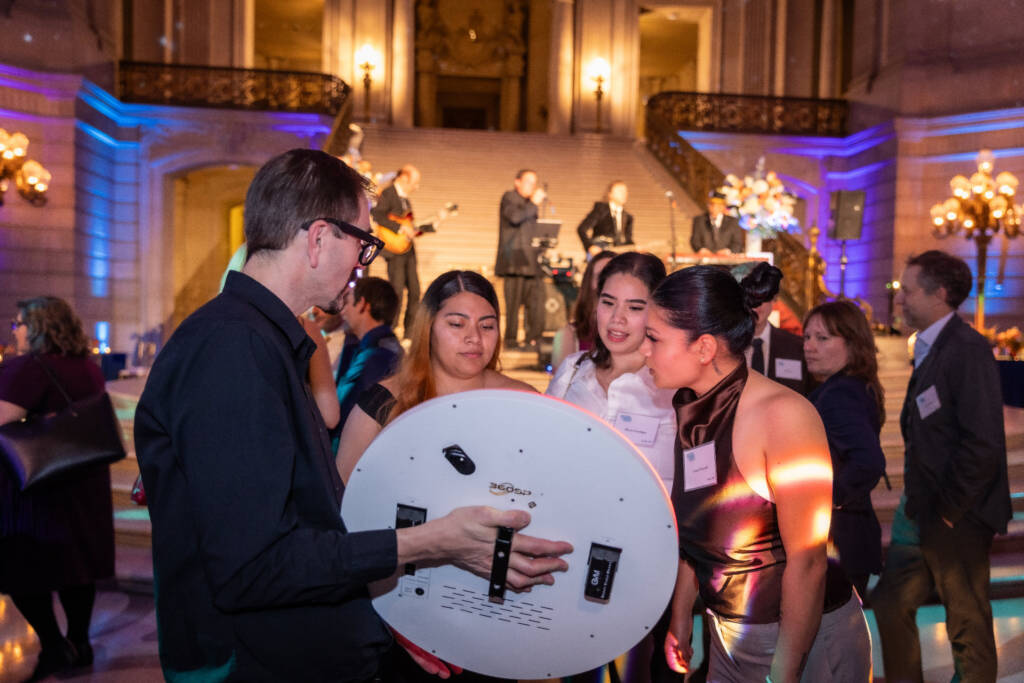 Guests at a corporate gala photo booth